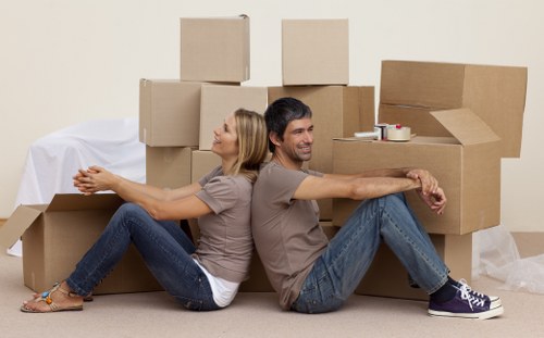 Movers loading items carefully outside a Tottenham Hale property