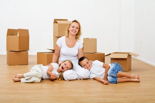 Packed boxes and furniture ready for a home move in Tottenham Hale
