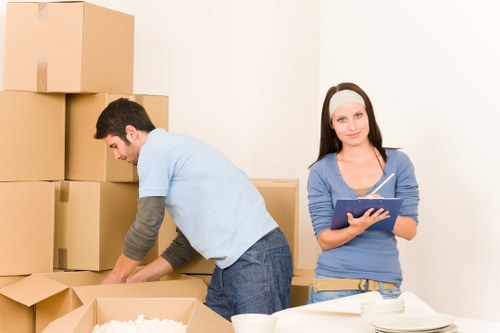 Local movers handling household furniture in Tottenham Hale