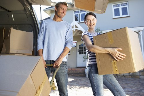 Local movers handling boxes and household items in Tottenham Hale